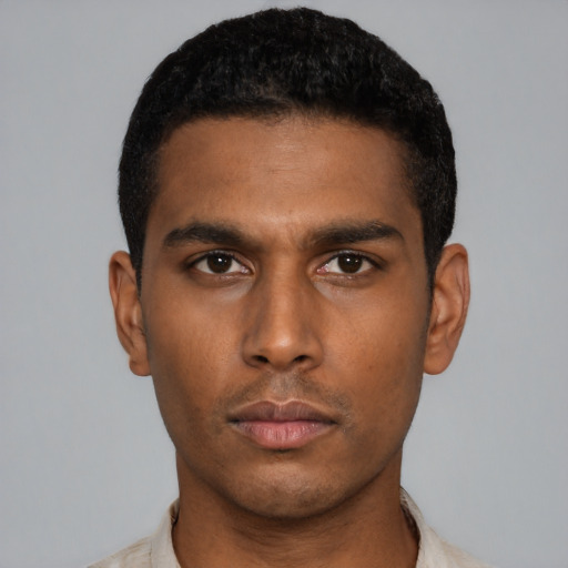 Neutral latino young-adult male with short  black hair and brown eyes