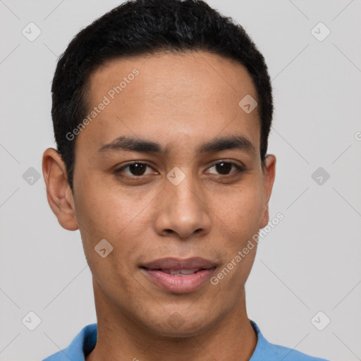 Joyful latino young-adult male with short  brown hair and brown eyes