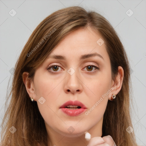 Joyful white young-adult female with long  brown hair and brown eyes