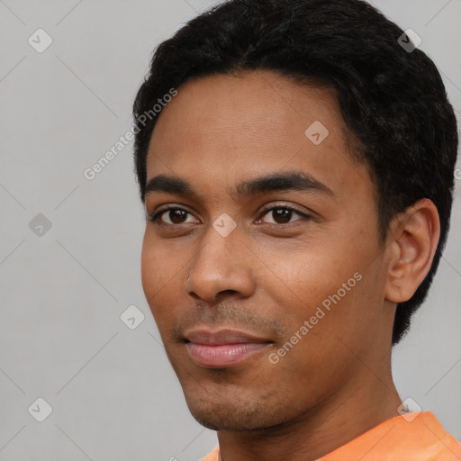 Neutral latino young-adult male with short  black hair and brown eyes