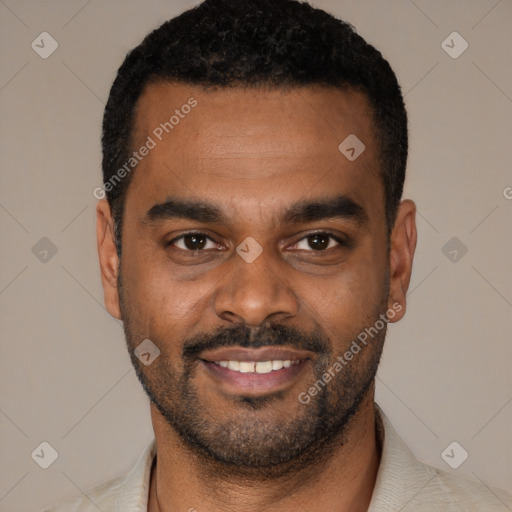 Joyful black young-adult male with short  black hair and brown eyes