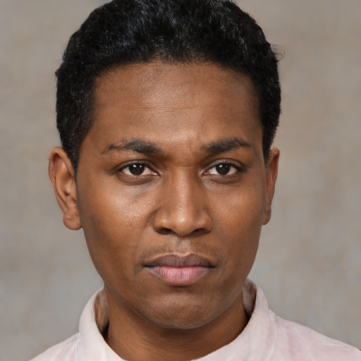 Neutral black young-adult male with short  black hair and brown eyes