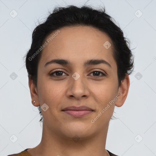 Joyful latino young-adult female with short  brown hair and brown eyes