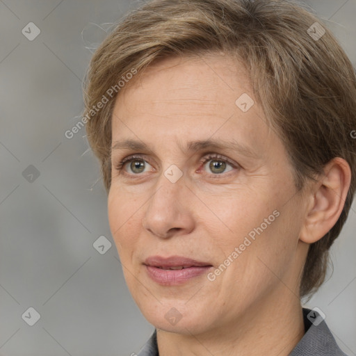 Joyful white adult female with short  brown hair and brown eyes