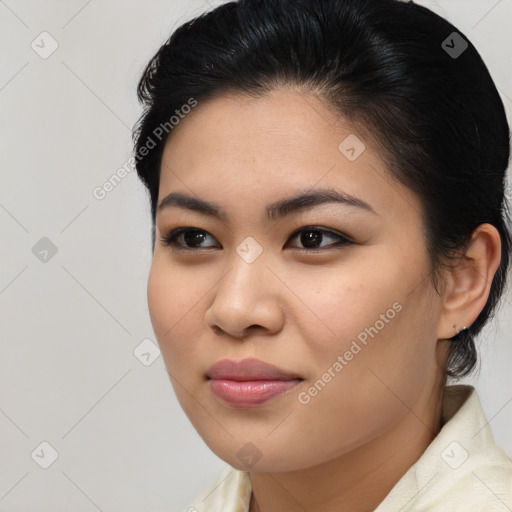 Joyful asian young-adult female with medium  brown hair and brown eyes