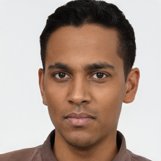 Neutral latino young-adult male with short  black hair and brown eyes