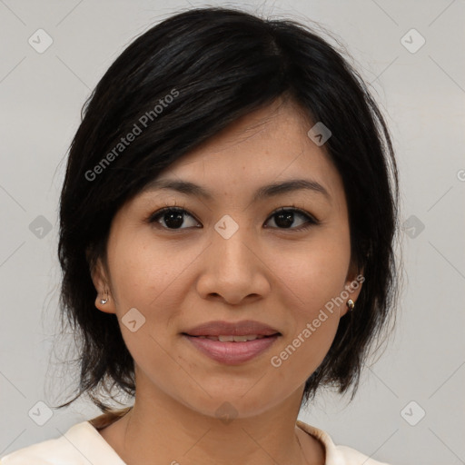 Joyful asian young-adult female with medium  brown hair and brown eyes