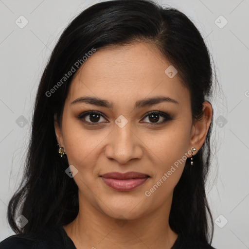 Joyful latino young-adult female with long  brown hair and brown eyes