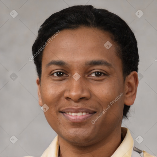 Joyful latino young-adult male with short  black hair and brown eyes