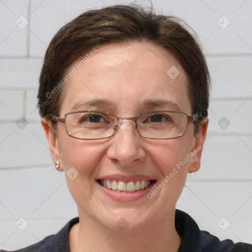 Joyful white adult female with short  brown hair and grey eyes