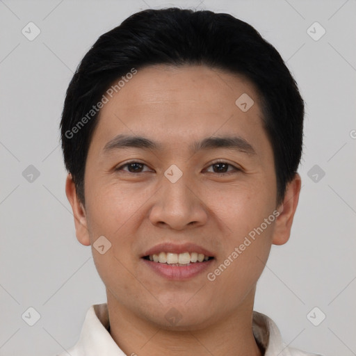 Joyful asian young-adult male with short  black hair and brown eyes