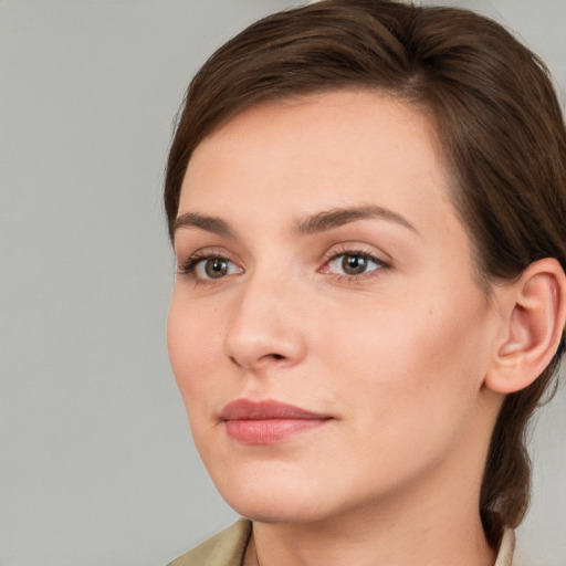 Neutral white young-adult female with medium  brown hair and grey eyes