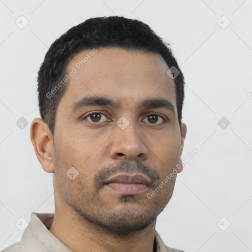 Neutral latino young-adult male with short  black hair and brown eyes