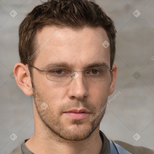 Neutral white adult male with short  brown hair and grey eyes