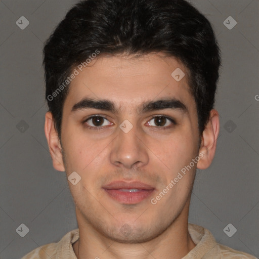 Joyful latino young-adult male with short  brown hair and brown eyes