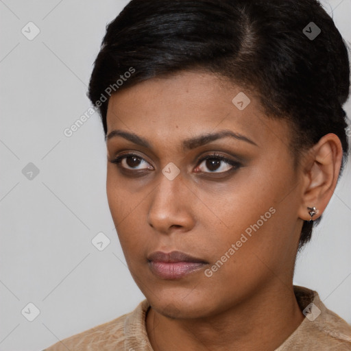 Neutral black young-adult female with short  brown hair and brown eyes