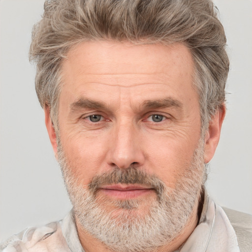 Neutral white middle-aged male with short  gray hair and brown eyes