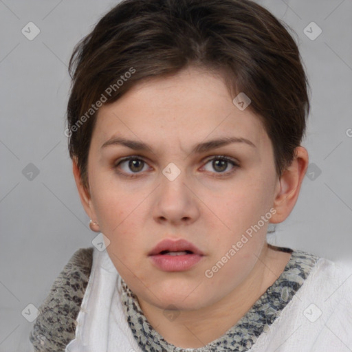 Neutral white young-adult female with short  brown hair and grey eyes