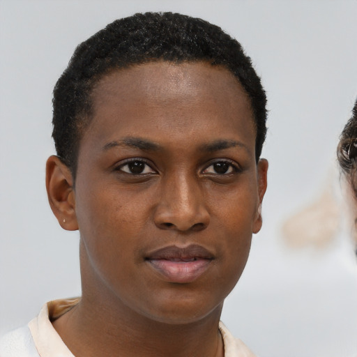 Neutral black young-adult female with short  brown hair and brown eyes
