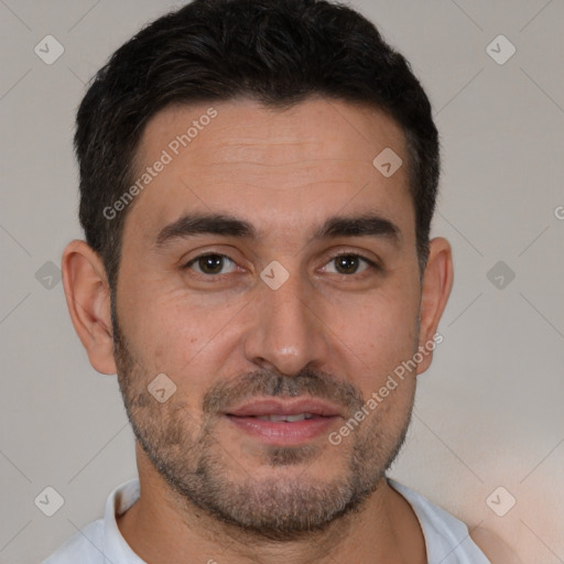 Joyful white young-adult male with short  brown hair and brown eyes