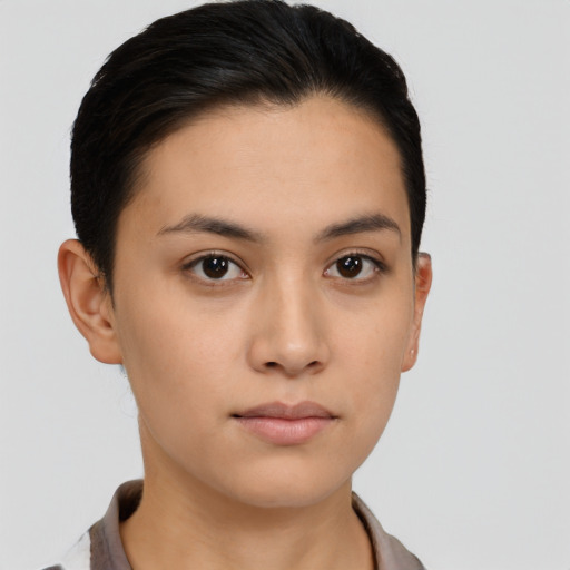 Neutral latino young-adult female with short  black hair and brown eyes