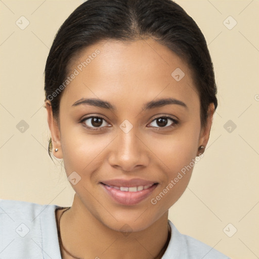 Joyful latino young-adult female with short  brown hair and brown eyes