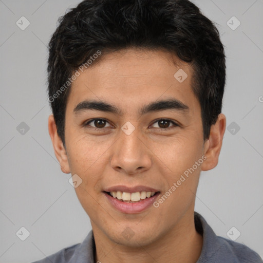 Joyful latino young-adult male with short  brown hair and brown eyes