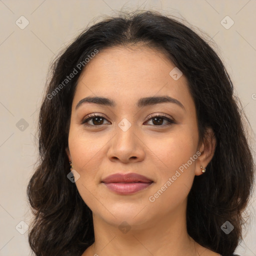 Joyful latino young-adult female with medium  brown hair and brown eyes