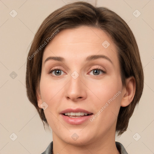 Joyful white young-adult female with medium  brown hair and grey eyes