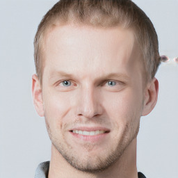 Joyful white adult male with short  brown hair and grey eyes