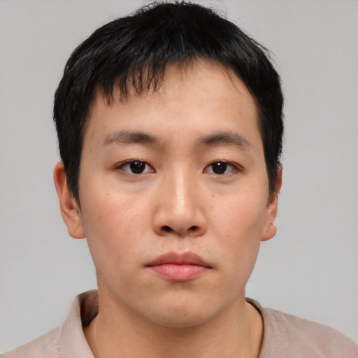 Neutral asian young-adult male with short  brown hair and brown eyes
