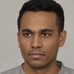 Neutral latino young-adult male with short  black hair and brown eyes