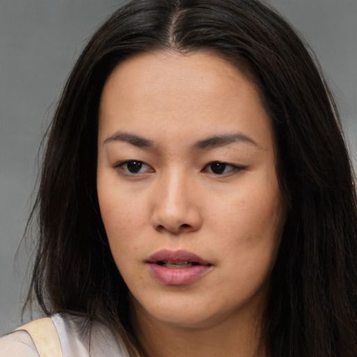 Neutral asian young-adult female with long  brown hair and brown eyes