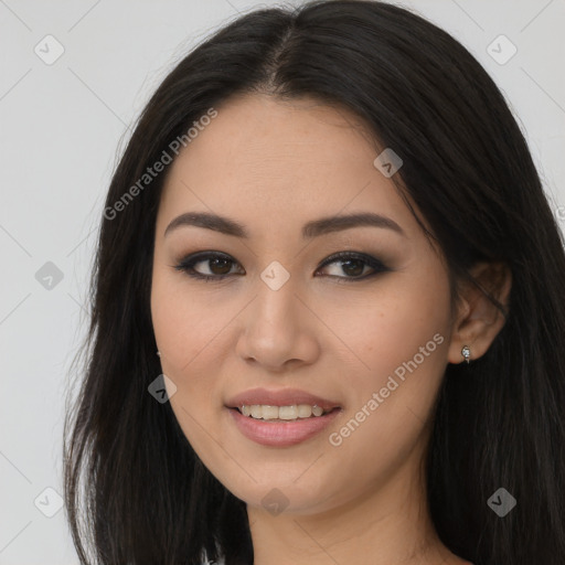 Joyful asian young-adult female with long  brown hair and brown eyes