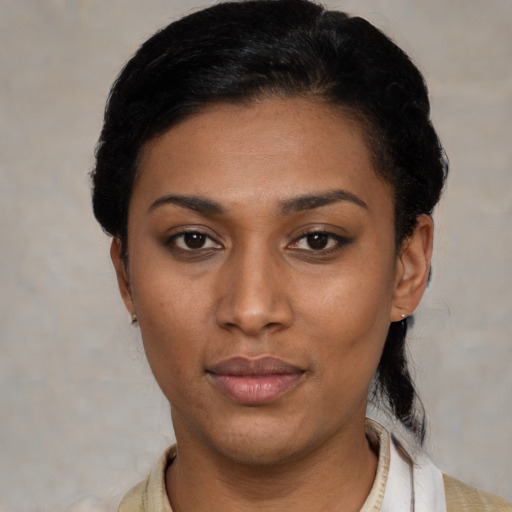 Neutral latino young-adult female with short  black hair and brown eyes