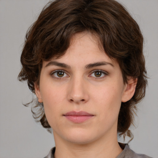 Neutral white young-adult female with medium  brown hair and brown eyes