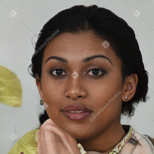 Joyful latino young-adult female with short  black hair and brown eyes