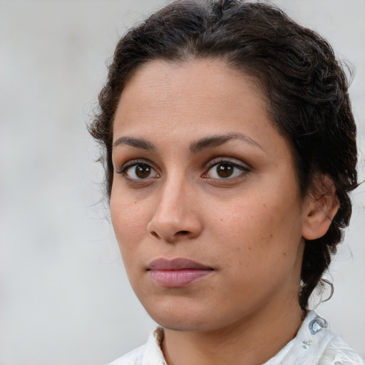 Neutral white young-adult female with medium  brown hair and brown eyes