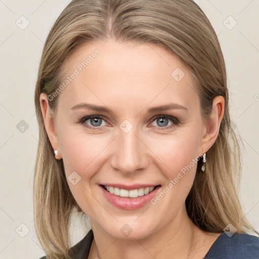 Joyful white young-adult female with medium  brown hair and blue eyes