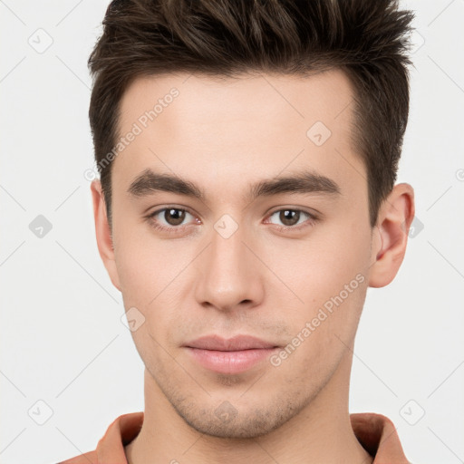 Neutral white young-adult male with short  brown hair and brown eyes