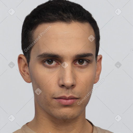 Neutral latino young-adult male with short  black hair and brown eyes