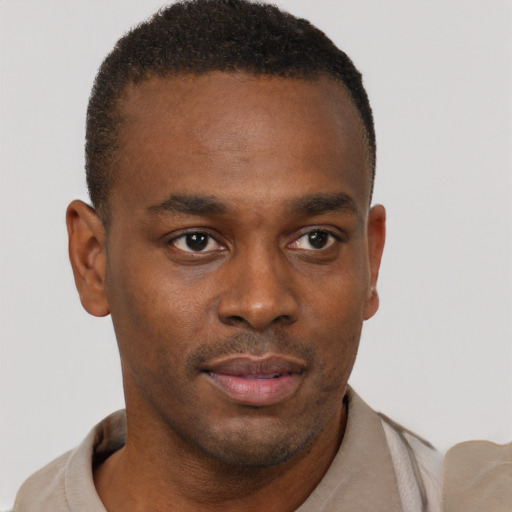 Neutral black young-adult male with short  brown hair and brown eyes