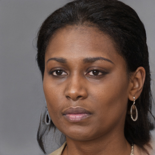 Neutral black young-adult female with long  black hair and brown eyes