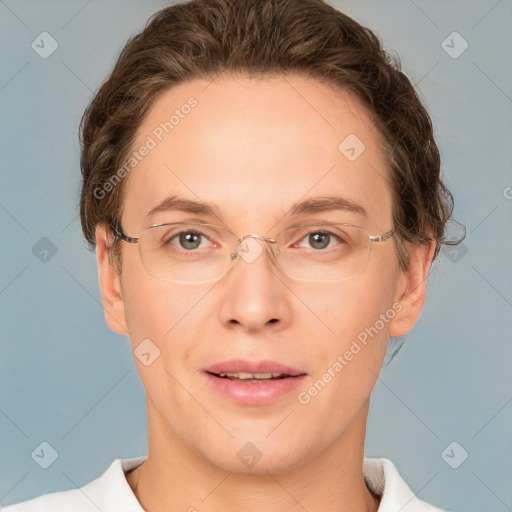 Joyful white adult female with short  brown hair and grey eyes