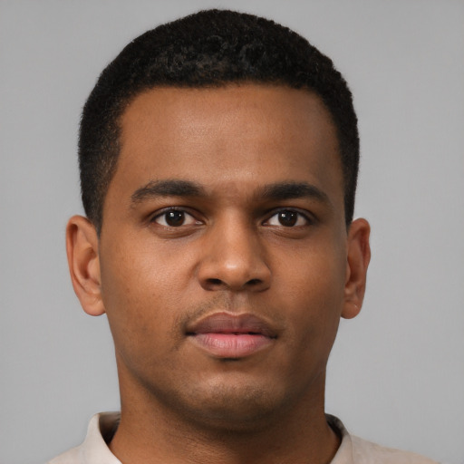 Neutral black young-adult male with short  brown hair and brown eyes