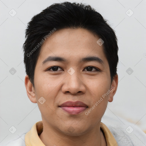 Joyful asian young-adult male with short  brown hair and brown eyes