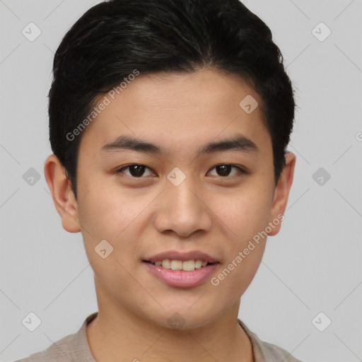 Joyful asian young-adult male with short  black hair and brown eyes