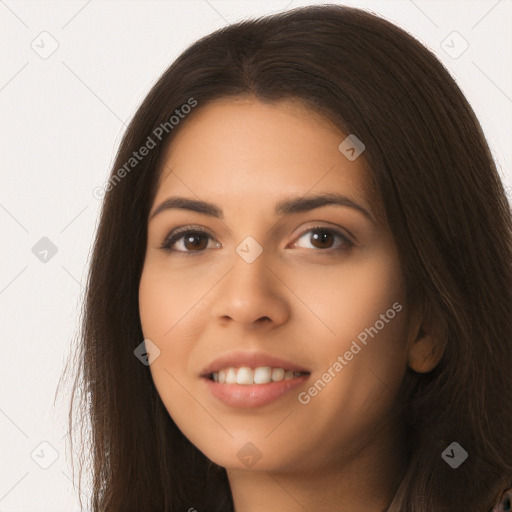 Joyful latino young-adult female with long  brown hair and brown eyes