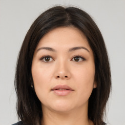 Neutral asian young-adult female with medium  brown hair and brown eyes