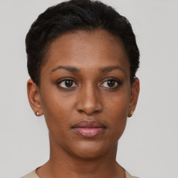 Neutral black young-adult female with short  brown hair and brown eyes